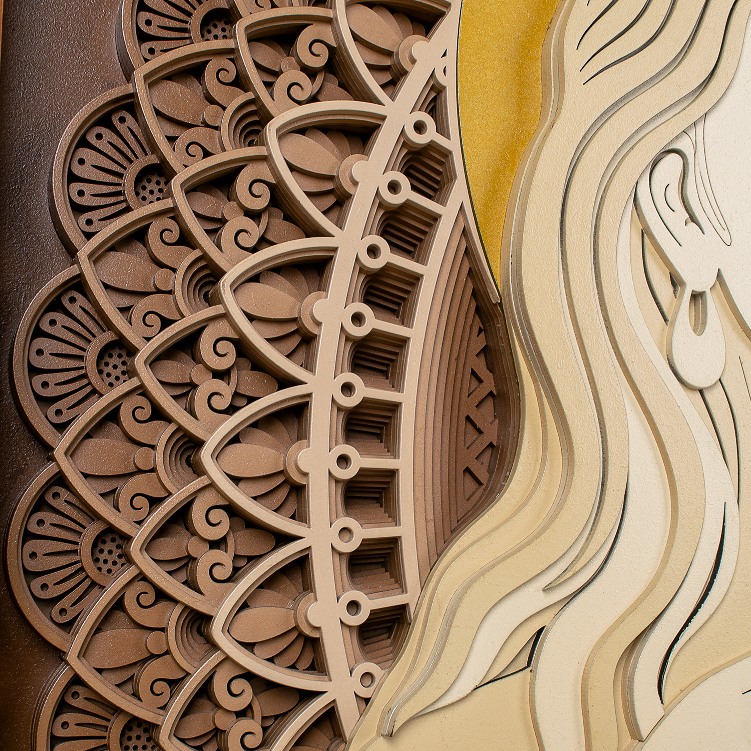 Intricate mandala pattern and raised layers behind Radha Krishna